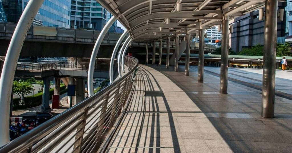 A beautiful curved empty walkway in a business park on a sunny day